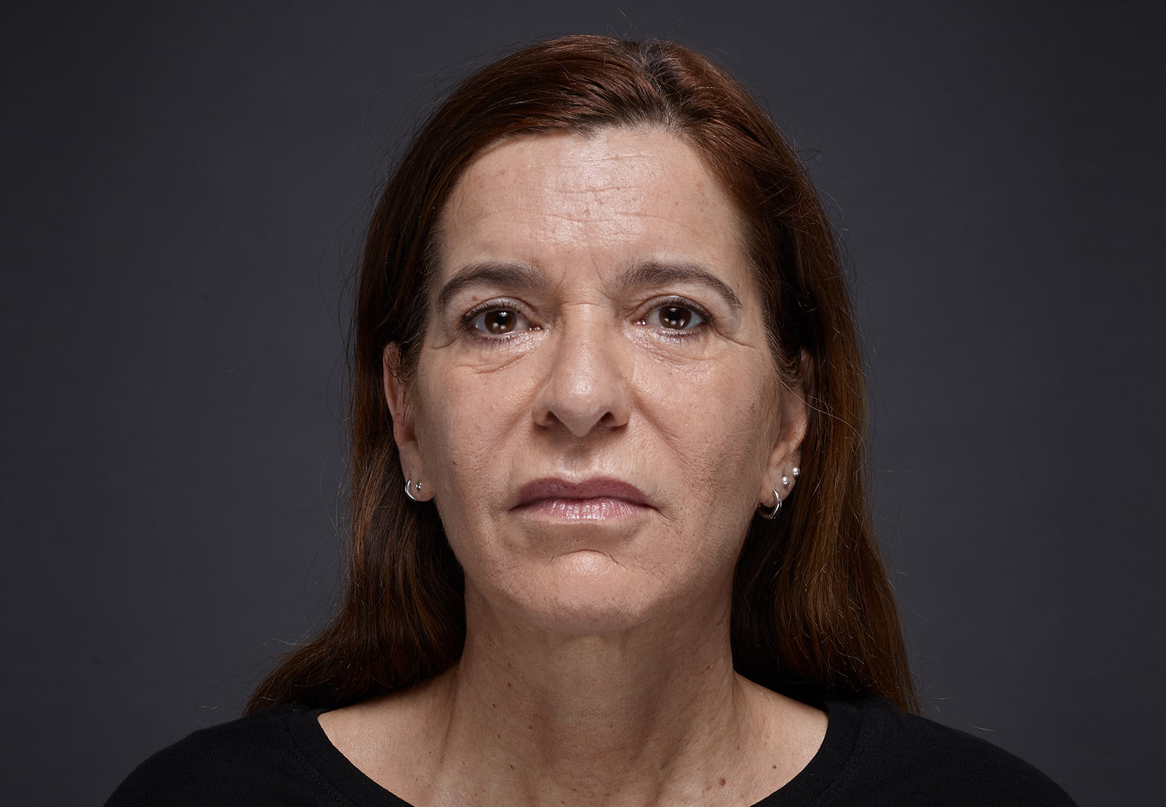 Woman face with brown eyes and brown hairs | Fillmed